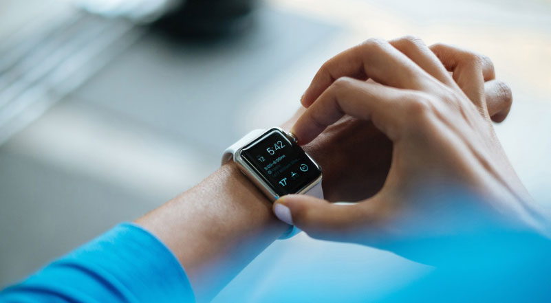 Person Wearing Smartwatch Person Wearing Smartwatch